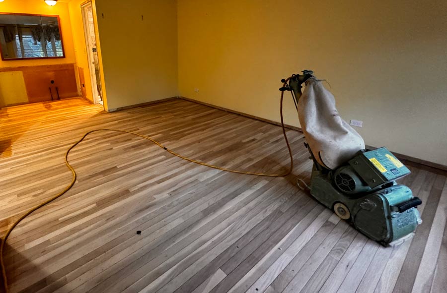 wood floor sanding machine in progress